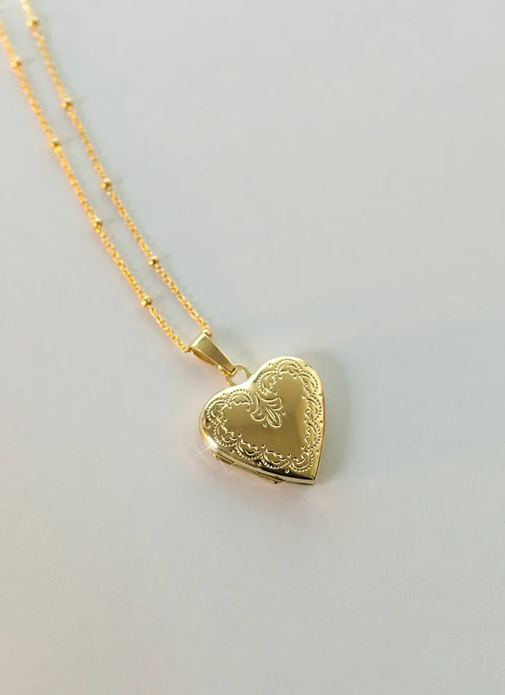 Aphrodite heart medaillon 14k gold